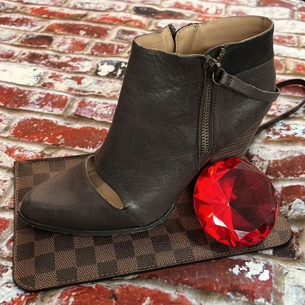 * Joe’s brown leather ankle boots with unique cut out detail